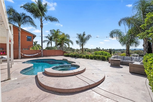 40493 Calle Katerine, Temecula, CA 92591 - view of pool with an outdoor hangout area, a patio, a fenced backyard, and a pool with connected hot tub