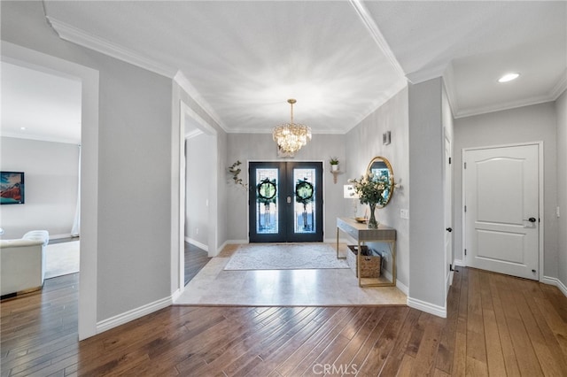 40493 Calle Katerine, Temecula, CA 92591 - entryway with a chandelier, wood-type flooring, ornamental molding, baseboards, and french doors