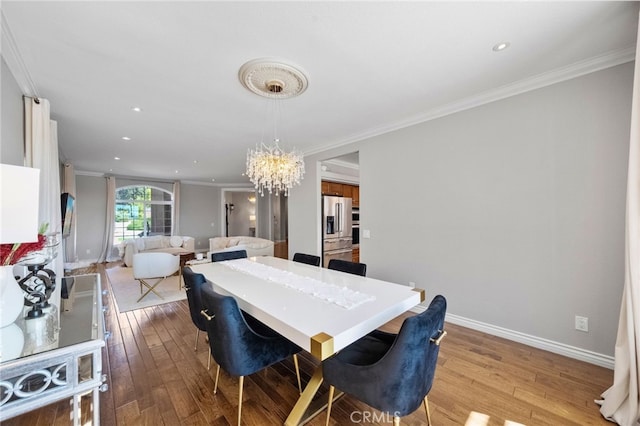 40493 Calle Katerine, Temecula, CA 92591 - dining space with a chandelier, crown molding, hardwood / wood-style floors, baseboards, and recessed lighting