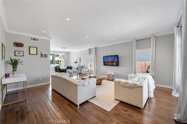 40493 Calle Katerine, Temecula, CA 92591 - living room with crown molding, hardwood / wood-style flooring, recessed lighting, and baseboards