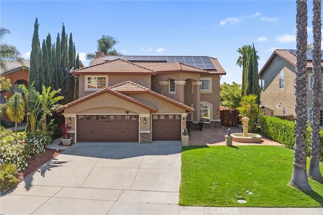 40493 Calle Katerine, Temecula, CA 92591 - mediterranean / spanish home featuring a front yard, stucco siding, solar panels, concrete driveway, and a tile roof