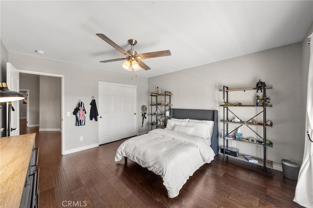 40493 Calle Katerine, Temecula, CA 92591 - bedroom featuring a closet, baseboards, dark wood finished floors, and ceiling fan