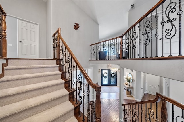 40493 Calle Katerine, Temecula, CA 92591 - entryway with a high ceiling, hardwood / wood-style floors, stairs, and a chandelier