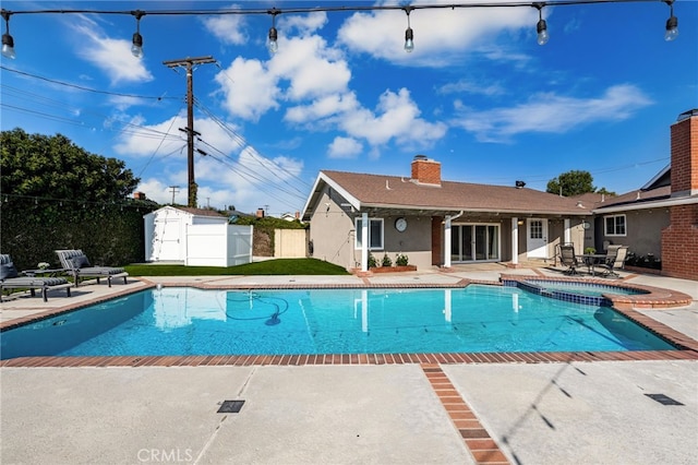 4571 Mimosa Dr, Yorba Linda, CA 92886 - view of swimming pool with a patio, fence, a shed, and an outdoor structure
