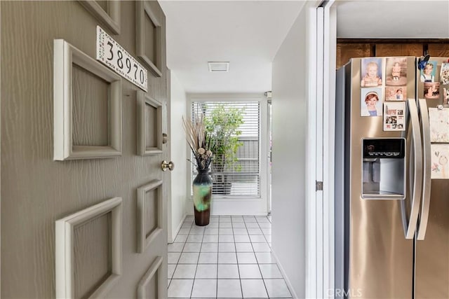 38970 Paseo De Oro, Murrieta, CA 92563 - doorway with light tile patterned flooring and baseboards