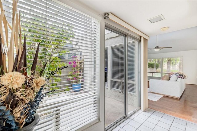 38970 Paseo De Oro, Murrieta, CA 92563 - doorway with light tile patterned flooring and a ceiling fan