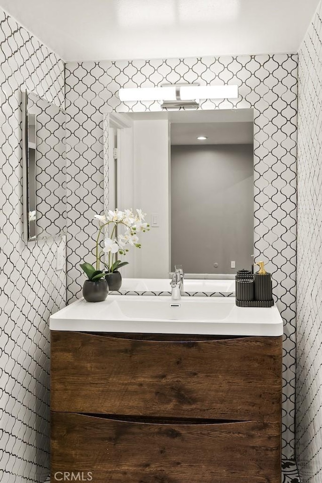 18620 Hatteras St Unit 223, Tarzana, CA 91356 - bathroom with vanity and tile walls