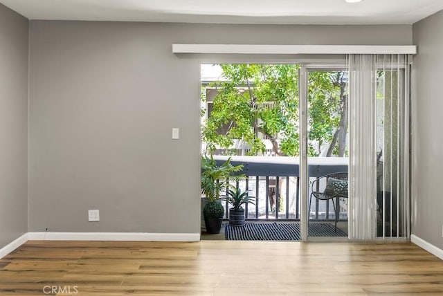 18620 Hatteras St Unit 223, Tarzana, CA 91356 - unfurnished room featuring wood finished floors and baseboards