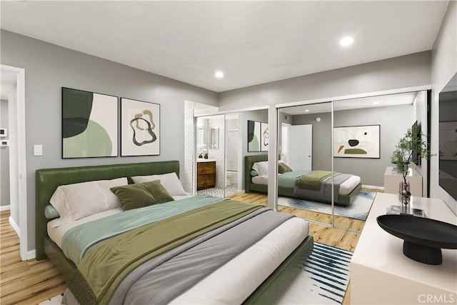 18620 Hatteras St Unit 223, Tarzana, CA 91356 - bedroom with wood finished floors, recessed lighting, and baseboards