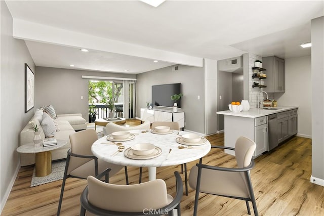 18620 Hatteras St Unit 223, Tarzana, CA 91356 - dining area featuring light wood-style flooring, baseboards, and recessed lighting