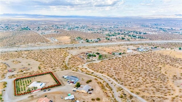 4428 Trumbo Ct, Phelan, CA 92371 - aerial view of sparsely populated area with property parcel outlined and a desert landscape