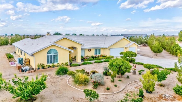 4428 Trumbo Ct, Phelan, CA 92371 - ranch-style home featuring a garage and concrete driveway