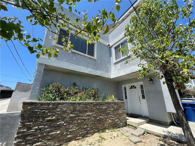 view of front of house with stucco siding