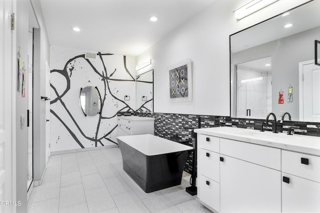 1524 Seabridge Ln, Oxnard, CA 93035 - full bath with recessed lighting, two vanities, and a soaking tub