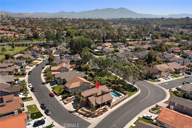 aerial perspective of suburban area featuring mountains