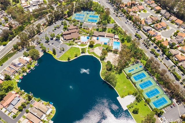 aerial view of residential area with a nearby body of water
