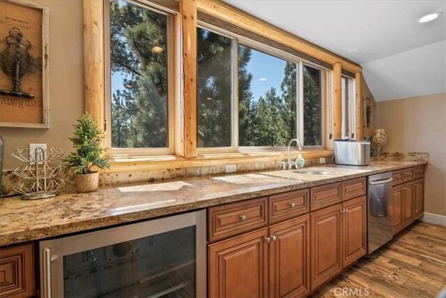 1020 Heritage Trl, Big Bear City, CA 92314 - kitchen with dishwasher, beverage cooler, healthy amount of natural light, and lofted ceiling