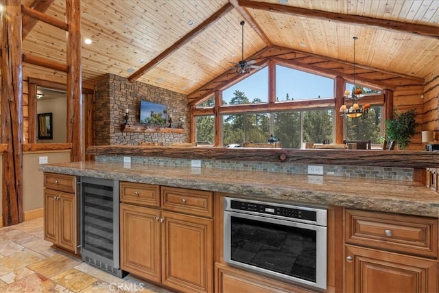 1020 Heritage Trl, Big Bear City, CA 92314 - kitchen with beverage cooler, wooden ceiling, pendant lighting, brown cabinets, and a chandelier
