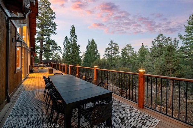 1020 Heritage Trl, Big Bear City, CA 92314 - deck at dusk with outdoor dining space