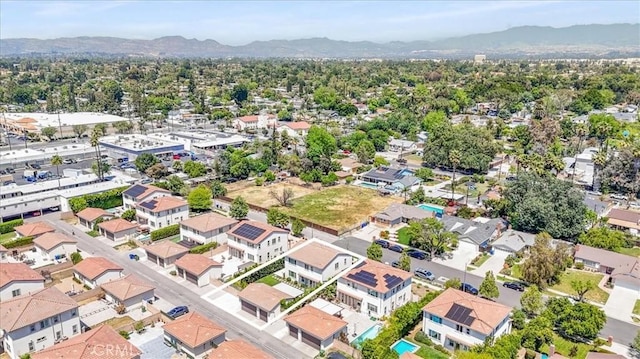 drone / aerial view of a mountain backdrop