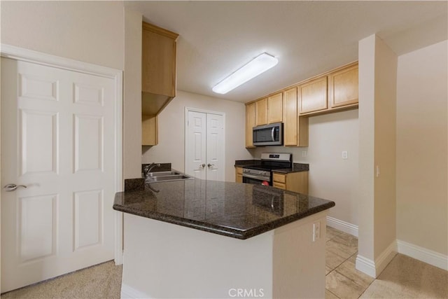 2400 Del Mar Way, Corona, CA 92882 - kitchen featuring appliances with stainless steel finishes, a sink, a peninsula, baseboards, and light brown cabinets