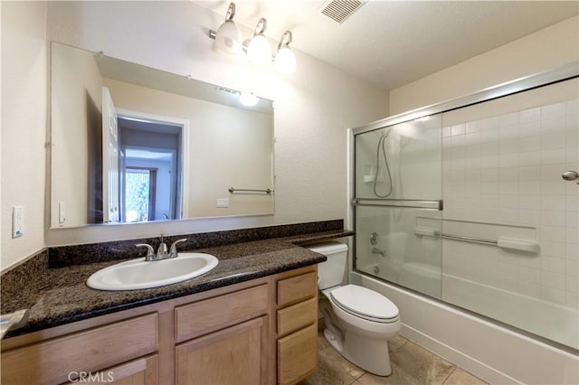 2400 Del Mar Way, Corona, CA 92882 - bathroom with toilet, vanity, shower / bath combination with glass door, and tile patterned flooring