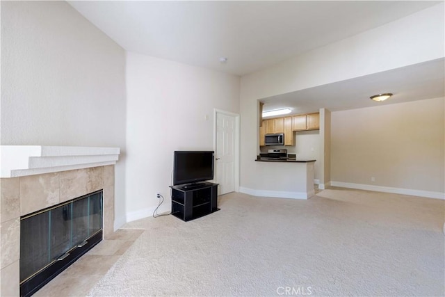 2400 Del Mar Way, Corona, CA 92882 - unfurnished living room featuring light carpet, a fireplace, and baseboards
