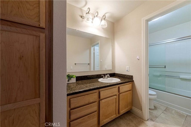 2400 Del Mar Way, Corona, CA 92882 - full bath featuring toilet, vanity, and combined bath / shower with glass door