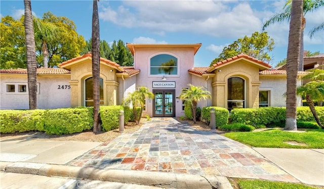 2400 Del Mar Way, Corona, CA 92882 - mediterranean / spanish-style house with french doors, a tile roof, and stucco siding