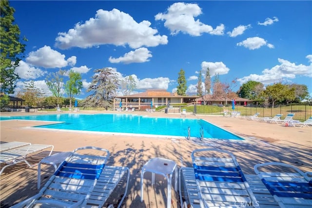 13624 La Jolla Cir Unit D, La Mirada, CA 90638 - community pool featuring fence and a patio area