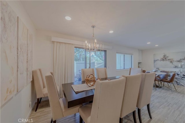 13624 La Jolla Cir Unit D, La Mirada, CA 90638 - dining room with a chandelier, recessed lighting, light wood finished floors, and baseboards