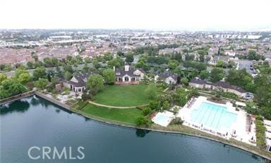 bird's eye view of a pool and a large body of water