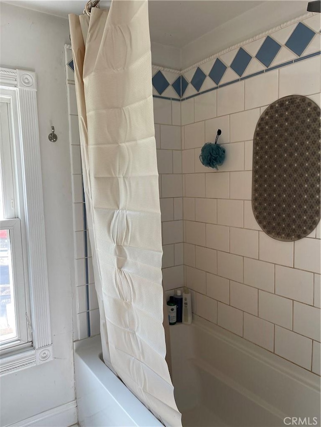 12409 Stamper Rd, Girard, IL 62640 - bathroom featuring shower / tub combo with curtain