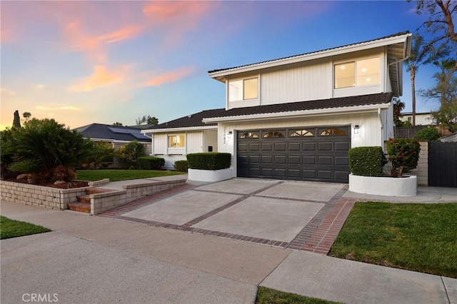 25082 Ericson Way, Laguna Hills, CA 92653 - traditional-style house featuring driveway and an attached garage