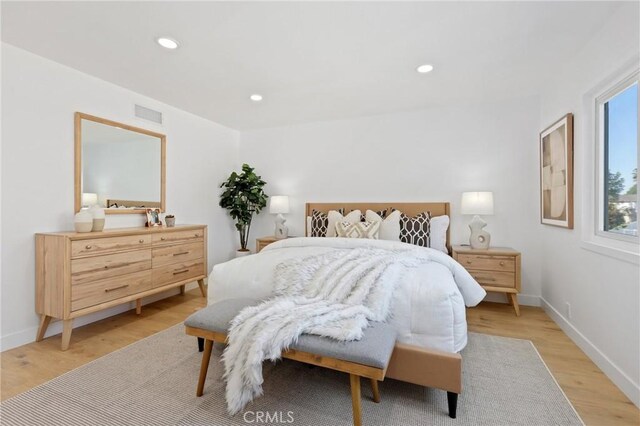 25082 Ericson Way, Laguna Hills, CA 92653 - bedroom with light wood-style floors, recessed lighting, and baseboards