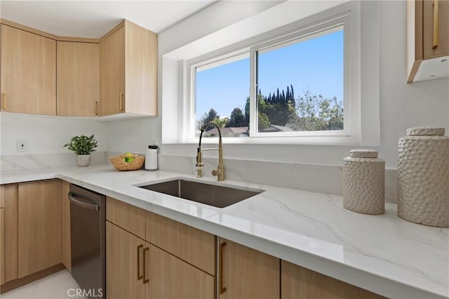 25082 Ericson Way, Laguna Hills, CA 92653 - kitchen with a sink, light stone countertops, healthy amount of natural light, and dishwasher