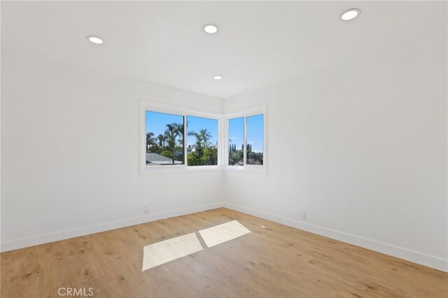 25082 Ericson Way, Laguna Hills, CA 92653 - spare room with baseboards, recessed lighting, and light wood-type flooring