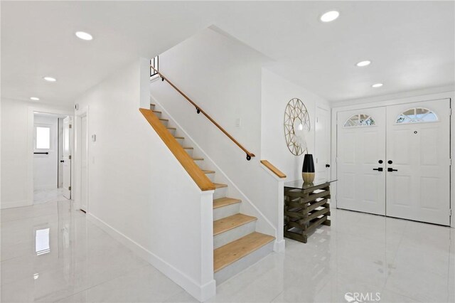 25082 Ericson Way, Laguna Hills, CA 92653 - entrance foyer featuring recessed lighting, stairway, tile patterned floors, and baseboards