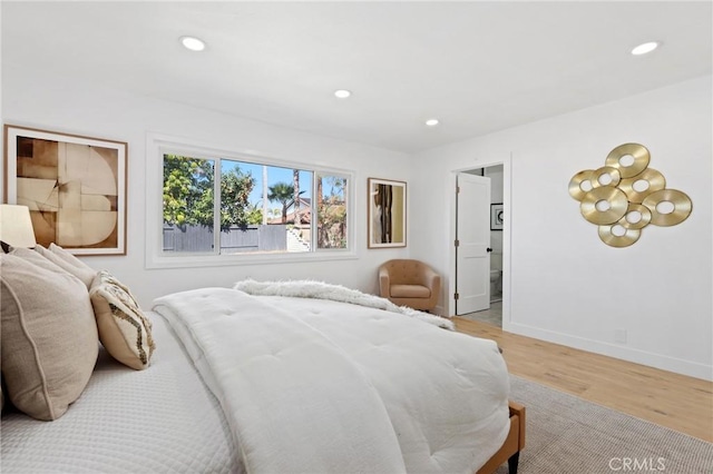 25082 Ericson Way, Laguna Hills, CA 92653 - bedroom with light wood-style floors, recessed lighting, and baseboards