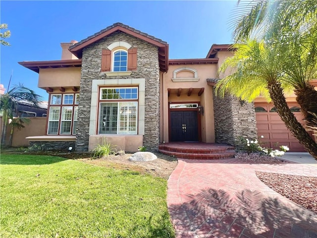 view of front facade featuring stone siding, stucco siding, a front lawn, and a garage