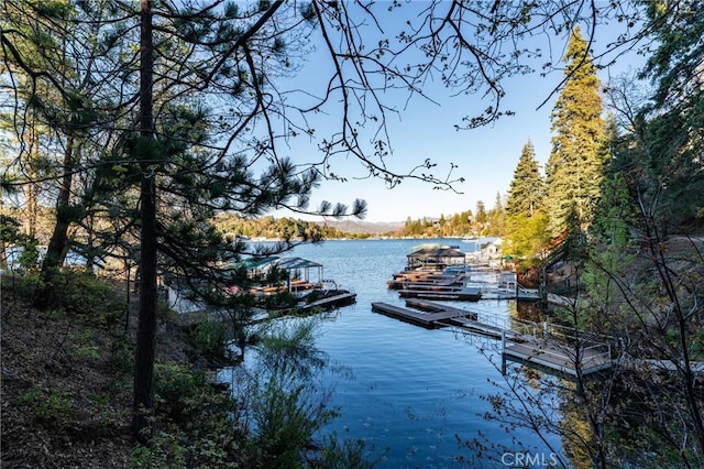 222 Holiday Dr, Lake Arrowhead, CA 92352 - dock featuring a water view and a wooded view
