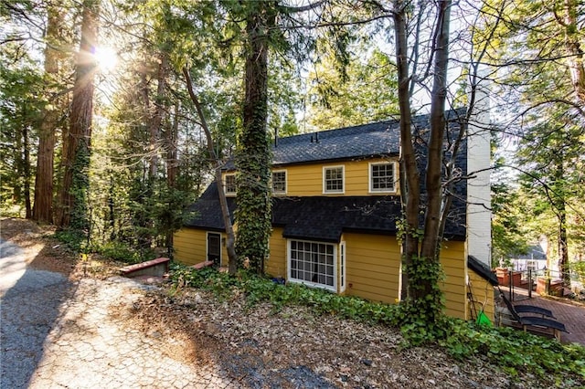 222 Holiday Dr, Lake Arrowhead, CA 92352 - view of front of house featuring a shingled roof