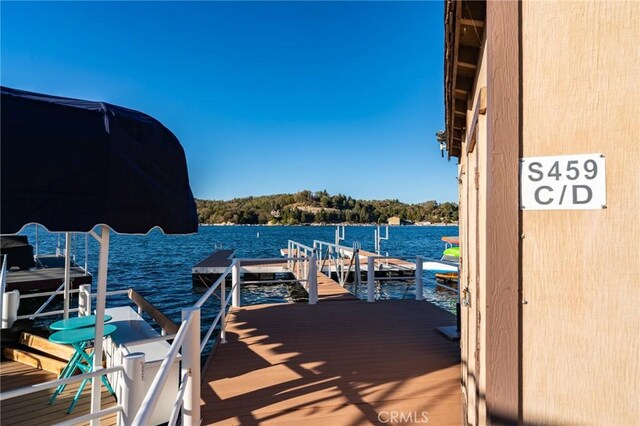 222 Holiday Dr, Lake Arrowhead, CA 92352 - dock featuring a water view and boat lift