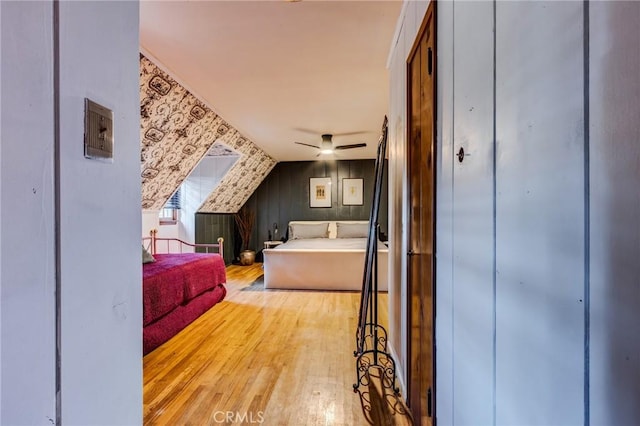 222 Holiday Dr, Lake Arrowhead, CA 92352 - bedroom featuring wood finished floors, wallpapered walls, and a closet
