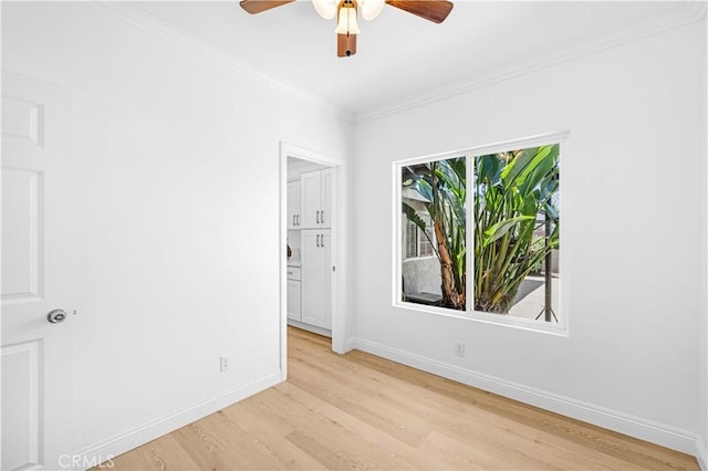 507 S Gaybar Ave, West Covina, CA 91790 - unfurnished room with ceiling fan, wood finished floors, baseboards, and crown molding