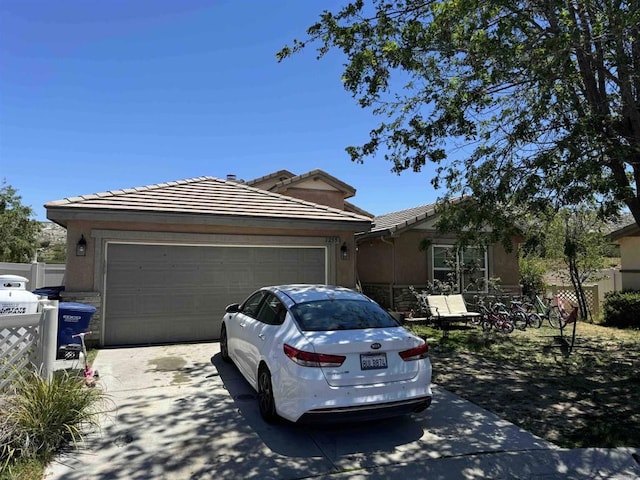 1255 Duckweed Trl, Campo, CA 91906 - single story home with driveway, a garage, stucco siding, a tile roof, and fence