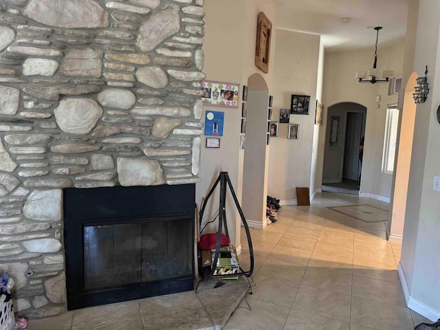 1255 Duckweed Trl, Campo, CA 91906 - hall featuring arched walkways, tile patterned flooring, baseboards, and a chandelier