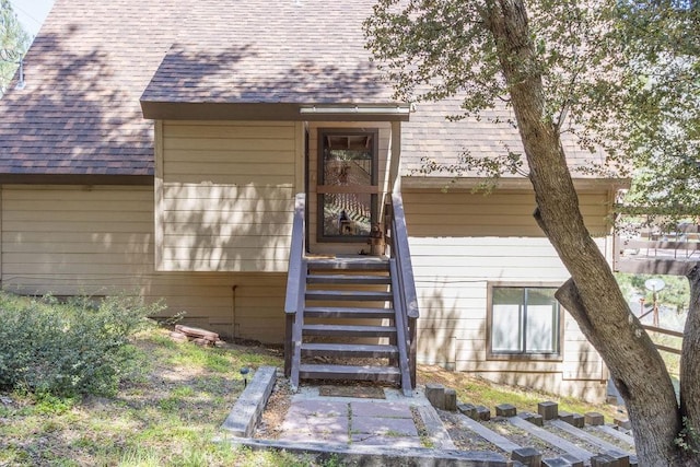 15616 San Moritz Dr, Pine Mountain Club, CA 93222 - view of exterior entry with roof with shingles