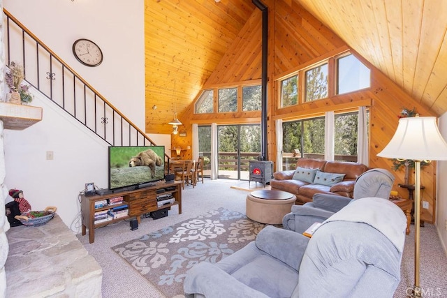 15616 San Moritz Dr, Pine Mountain Club, CA 93222 - carpeted living room with high vaulted ceiling, wood ceiling, wooden walls, and stairs