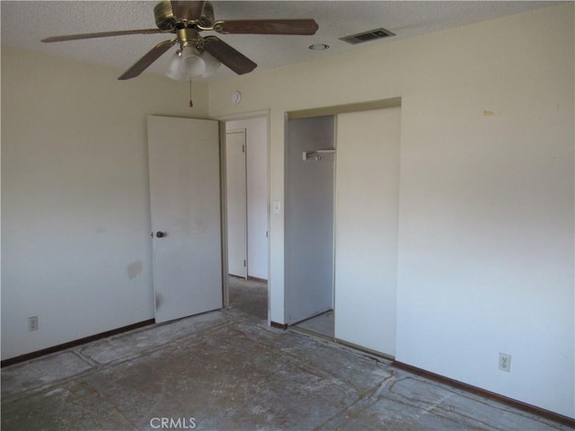 unfurnished bedroom featuring a closet and ceiling fan